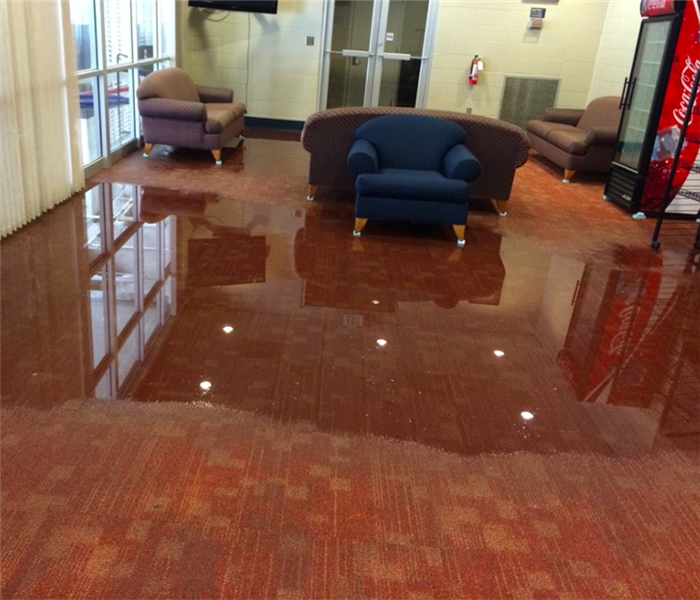 Flooding in waiting room of business.